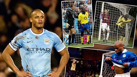 Trung vệ Vincent Kompany (trái) của Man City