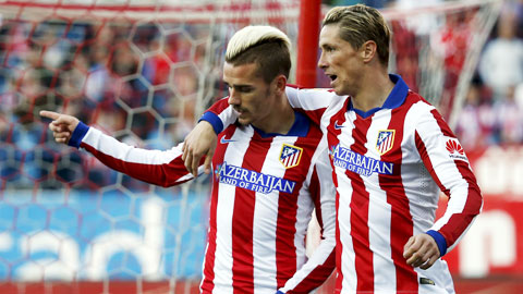 Griezman (trái) lập cú đúp đem về thắng lợi cho Atletico