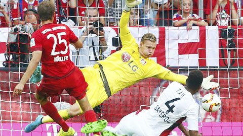 Thomas Mueller vừa kỷ niệm trận thứ 200 tại Bundesliga bằng cú đúp vào lưới Leverkusen